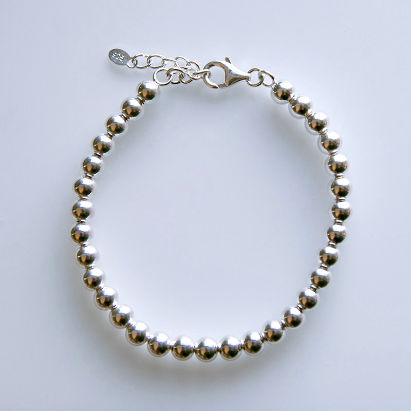 Bracelet noir : Un bracelet argent et perle pour hommes | CASTELD